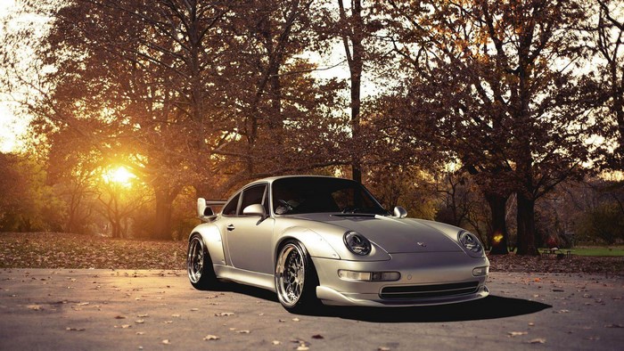 Silver Porsche 993 Turbo S parked in autumn park