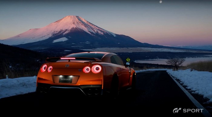 Nissan GT-R on road with Mount Fuji