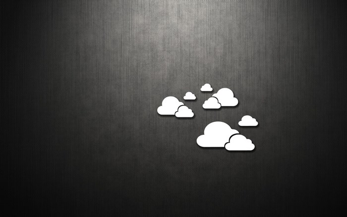 Minimalist clouds on a dark textured background