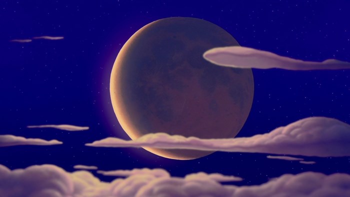Moon and clouds in the night sky