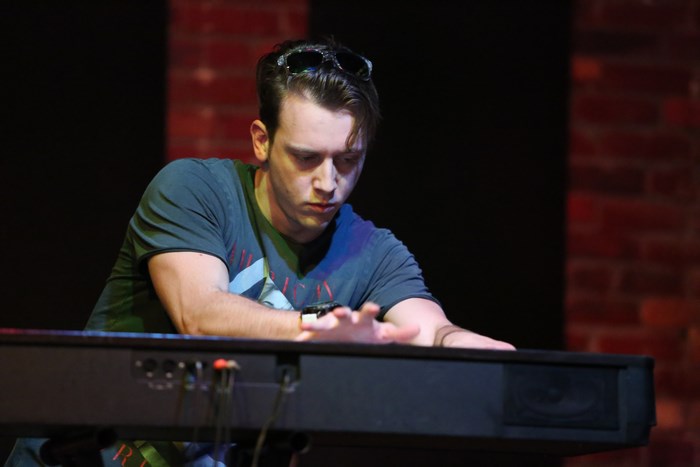 Man playing a keyboard