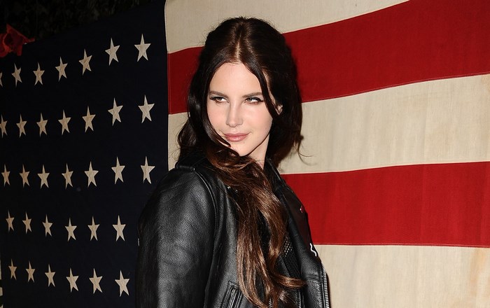 Lana Del Rey Posing in Front of American Flag