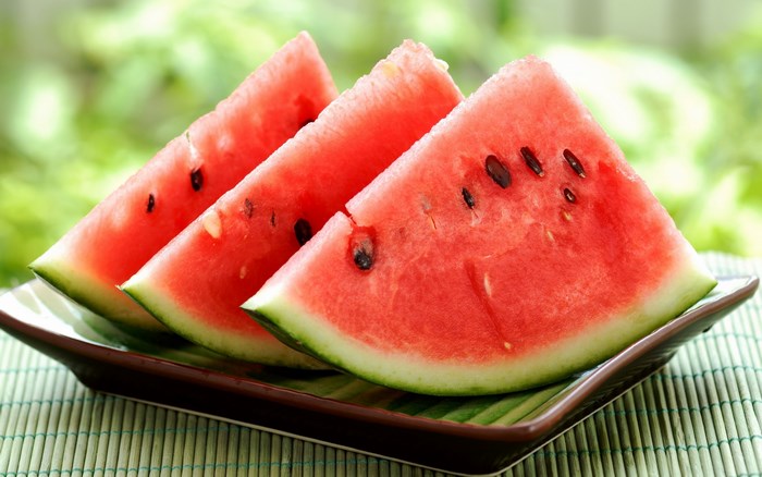 Three Slices of Watermelon on a Plate