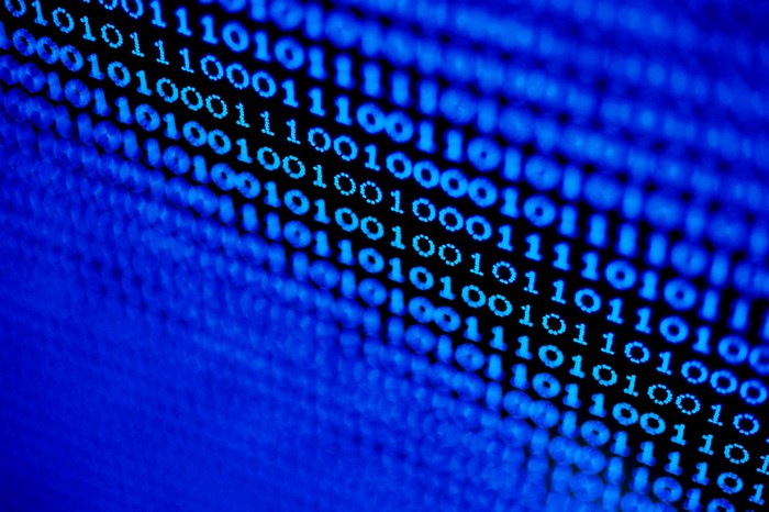 Blue binary code on a black background