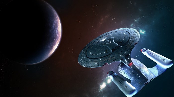 Starship Enterprise Approaching a Planet in Deep Space