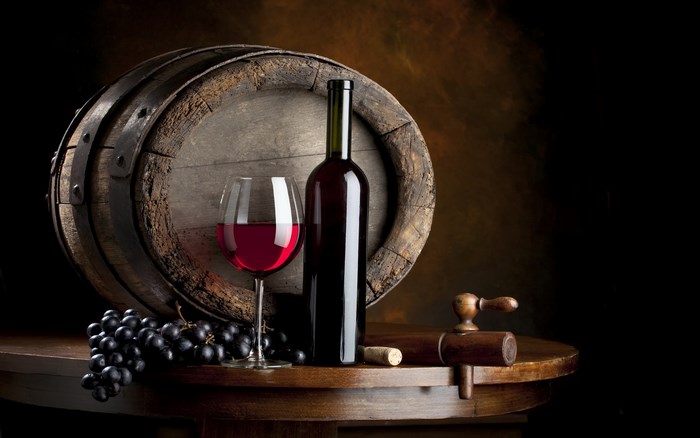 Wine Bottle, Glass, Grapes, and Wooden Barrel