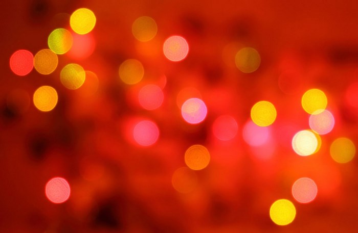 Bokeh lights on red background