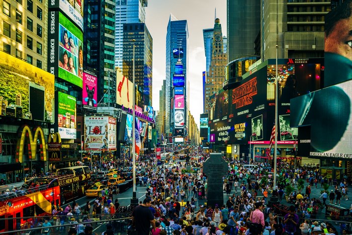 Times Square New York City with crowds and billboards