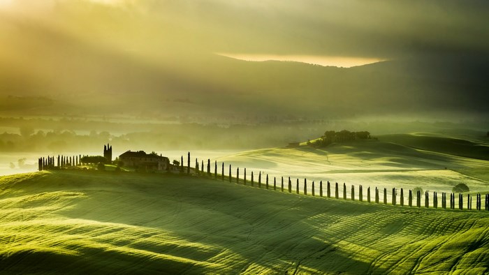 Tuscan Villa with Cypress Trees and Rolling Hills