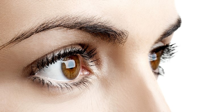 Close-up of a woman's brown eyes