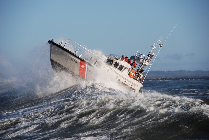 US Coast Guard boat navigating rough seas