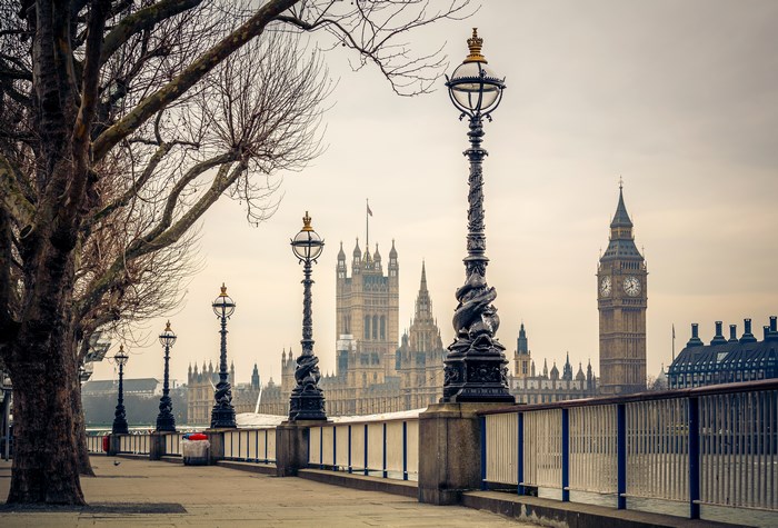 Big Ben and Palace of Westminster with street lamps