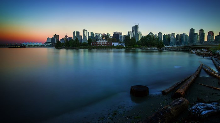 Vancouver skyline at dusk with water