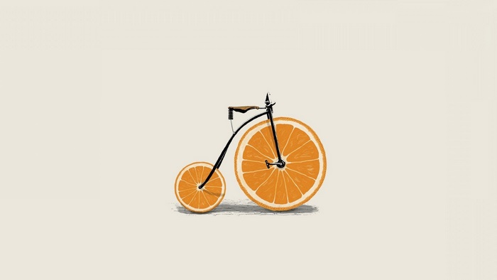 Penny-farthing bicycle with orange wheels