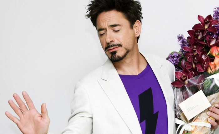 Robert Downey Jr. holding flowers