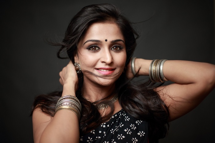 Portrait of Remya Nambeesan Smiling in Traditional Attire