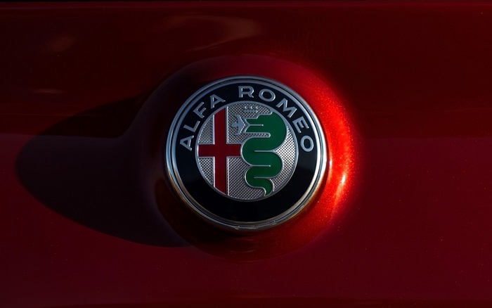 Alfa Romeo Logo on Red Car