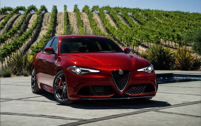 Red Alfa Romeo Giulia Quadrifoglio in Vineyard