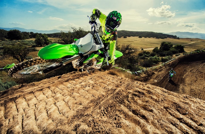 Kawasaki KX450F motocross rider jumping