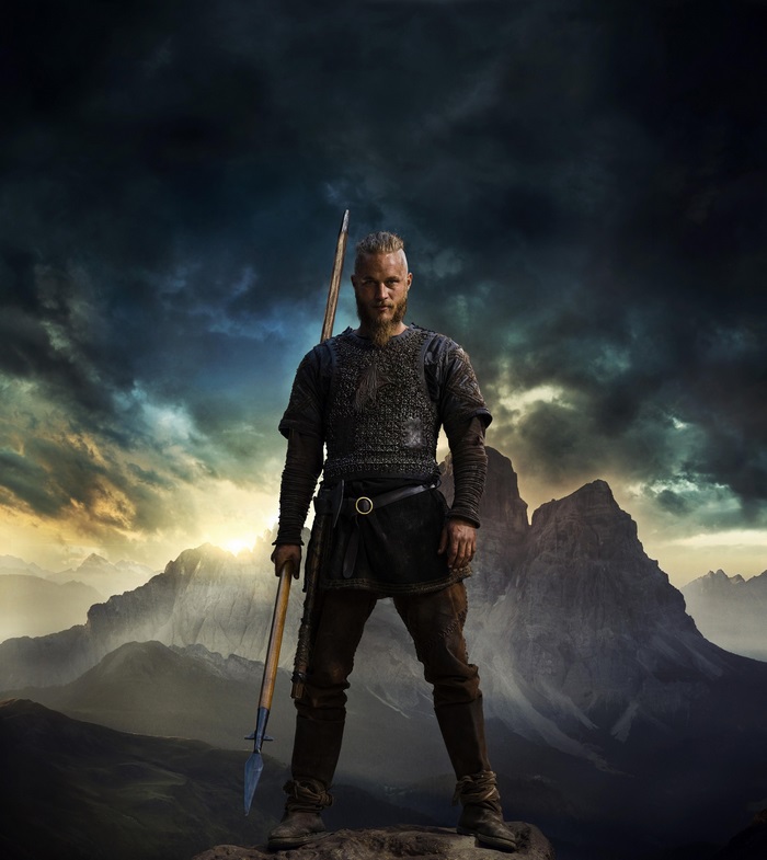 Viking Warrior Standing with Spear in Dramatic Landscape