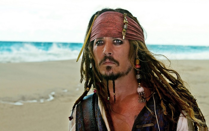 Johnny Depp as Jack Sparrow on a beach
