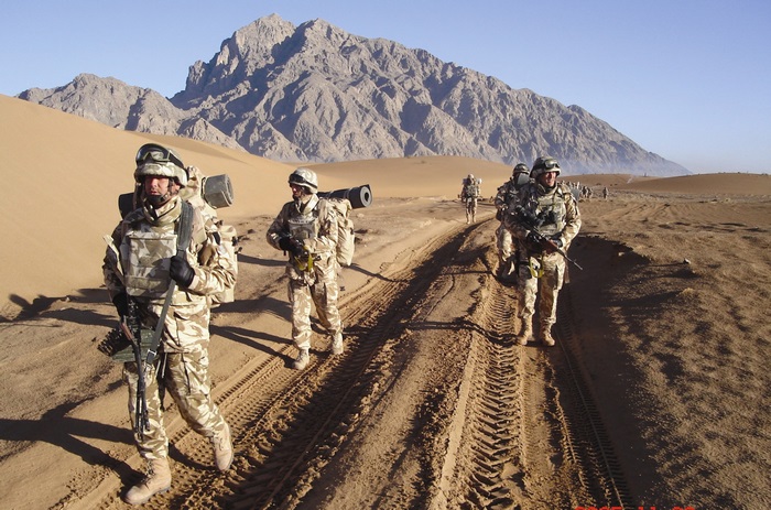 Romanian soldiers in desert landscape