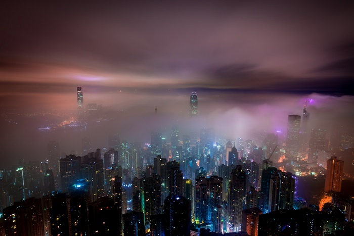 Hong Kong skyline shrouded in fog at night, 4K