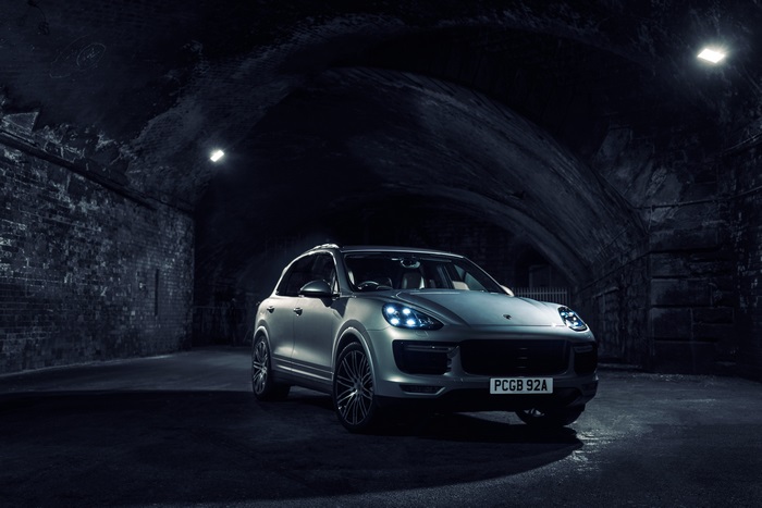 Porsche Cayenne in a dark tunnel