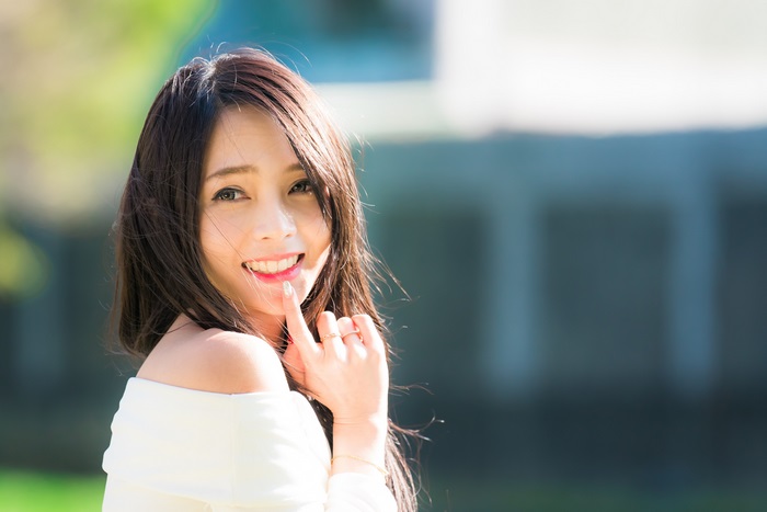 Smiling Asian Woman in Natural Light 4K
