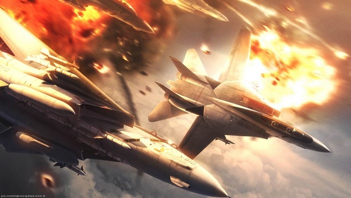 Fighter jets in aerial combat with explosions