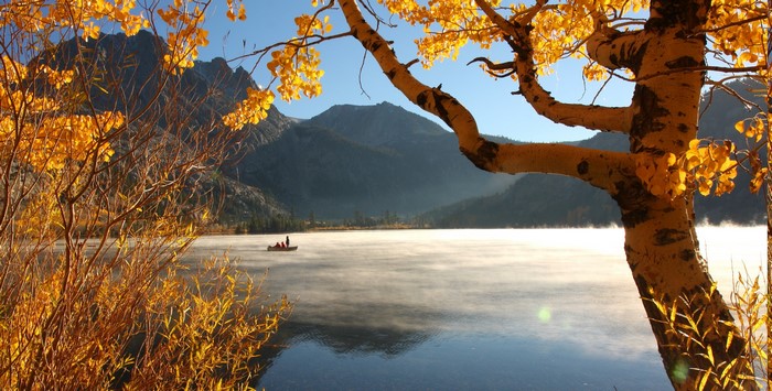 Autumn lake with mountains and trees