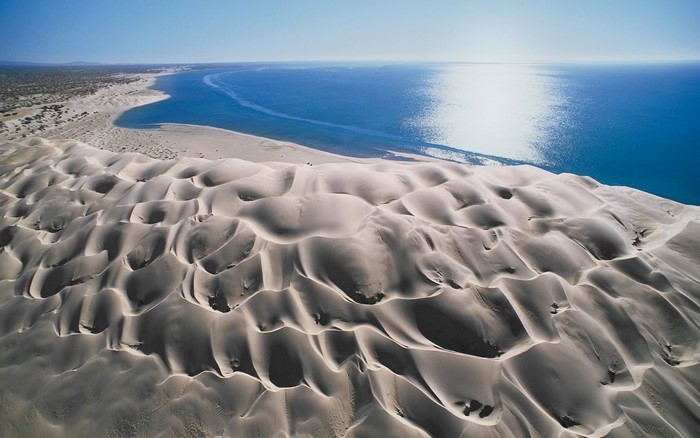 Sand dunes meet the ocean in Baja California, Mexico