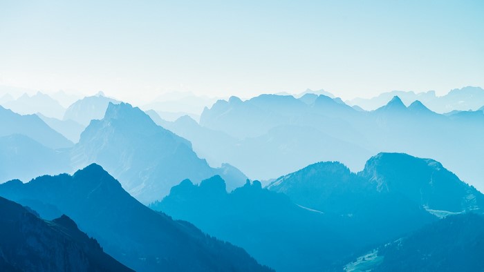 Blue mountain range landscape with clear sky