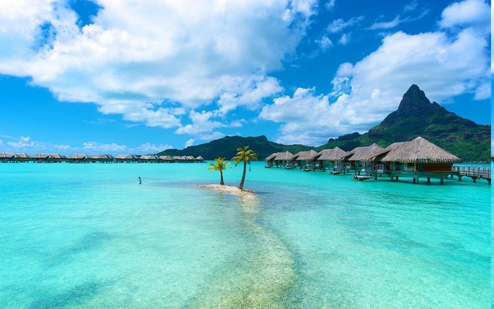 Bora Bora resort with overwater bungalows and Mount Otemanu