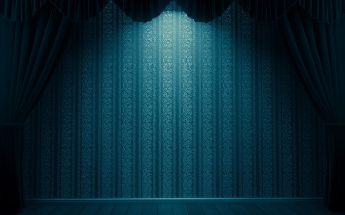 Stage with curtains and spotlight