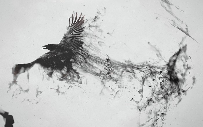 Monochrome digital art of a raven dissolving into ink