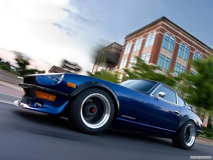 Blue Datsun 240Z with motion blur