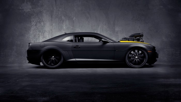 Sleek Matte Black Chevrolet Camaro with Exposed Engine