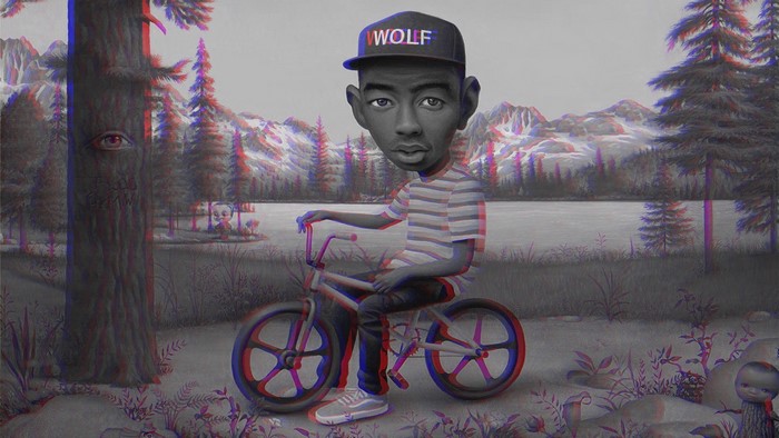 Tyler the Creator on a BMX bike in a forest