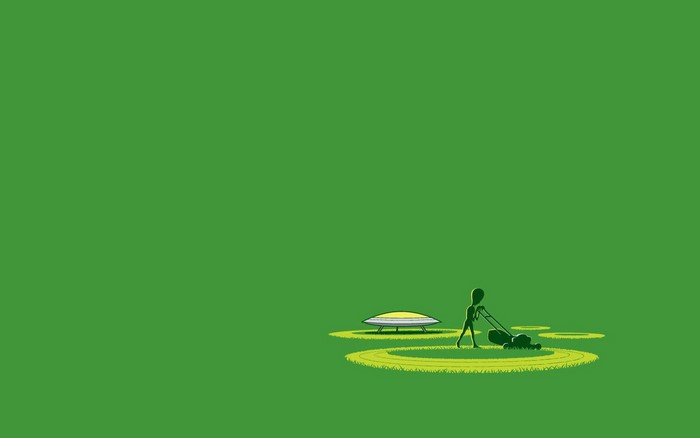 Alien mowing lawn next to UFO