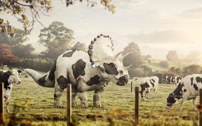 Triceratops with cow pattern in a farm with cows
