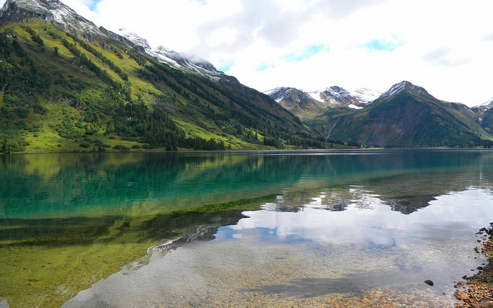 Serene Mountain Lake with Reflection in Siberia