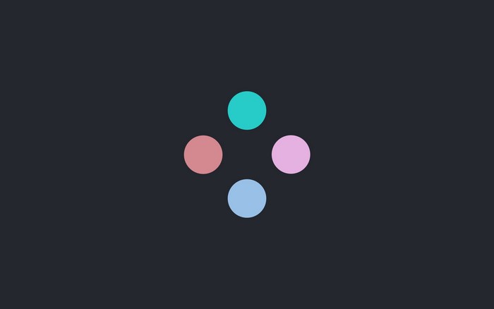 Four colored circles on a dark background