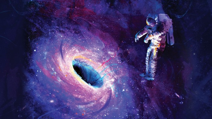 Astronaut near a colorful black hole in space
