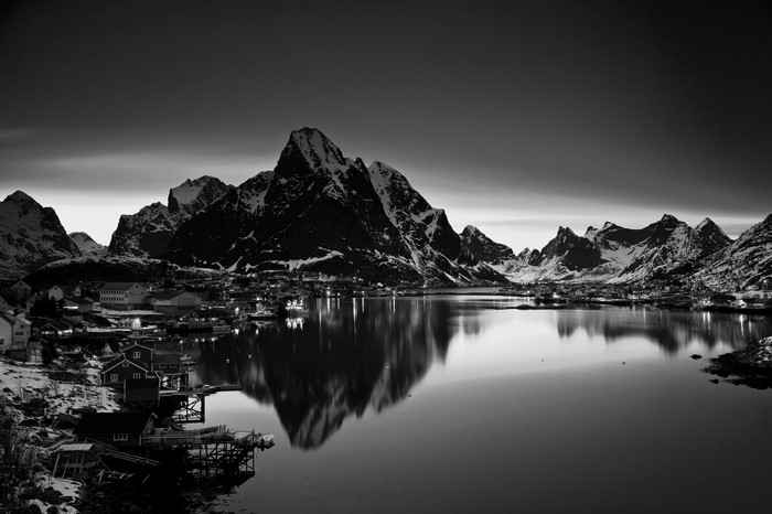 Monochrome Norway landscape with mountains and village