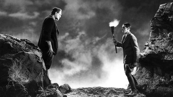 Frankenstein's Monster and a Man with a Torch