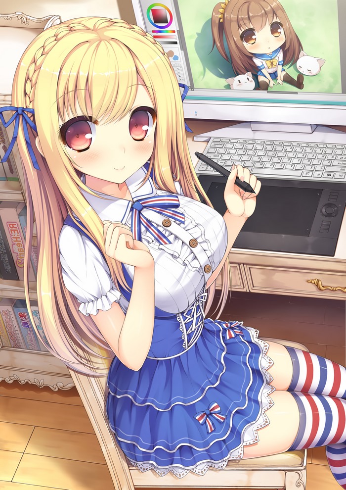 Anime girl drawing on a computer