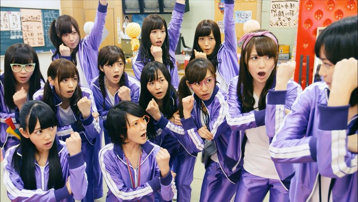 Nogizaka46 members in purple tracksuits