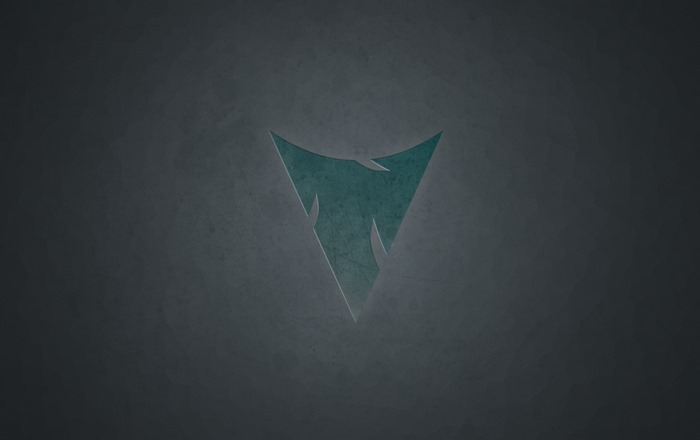 Teal triangle logo on dark background