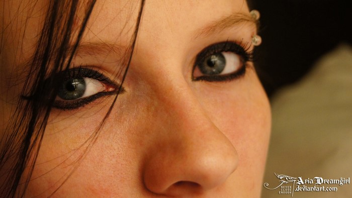 Close-up of a young woman's eyes and nose